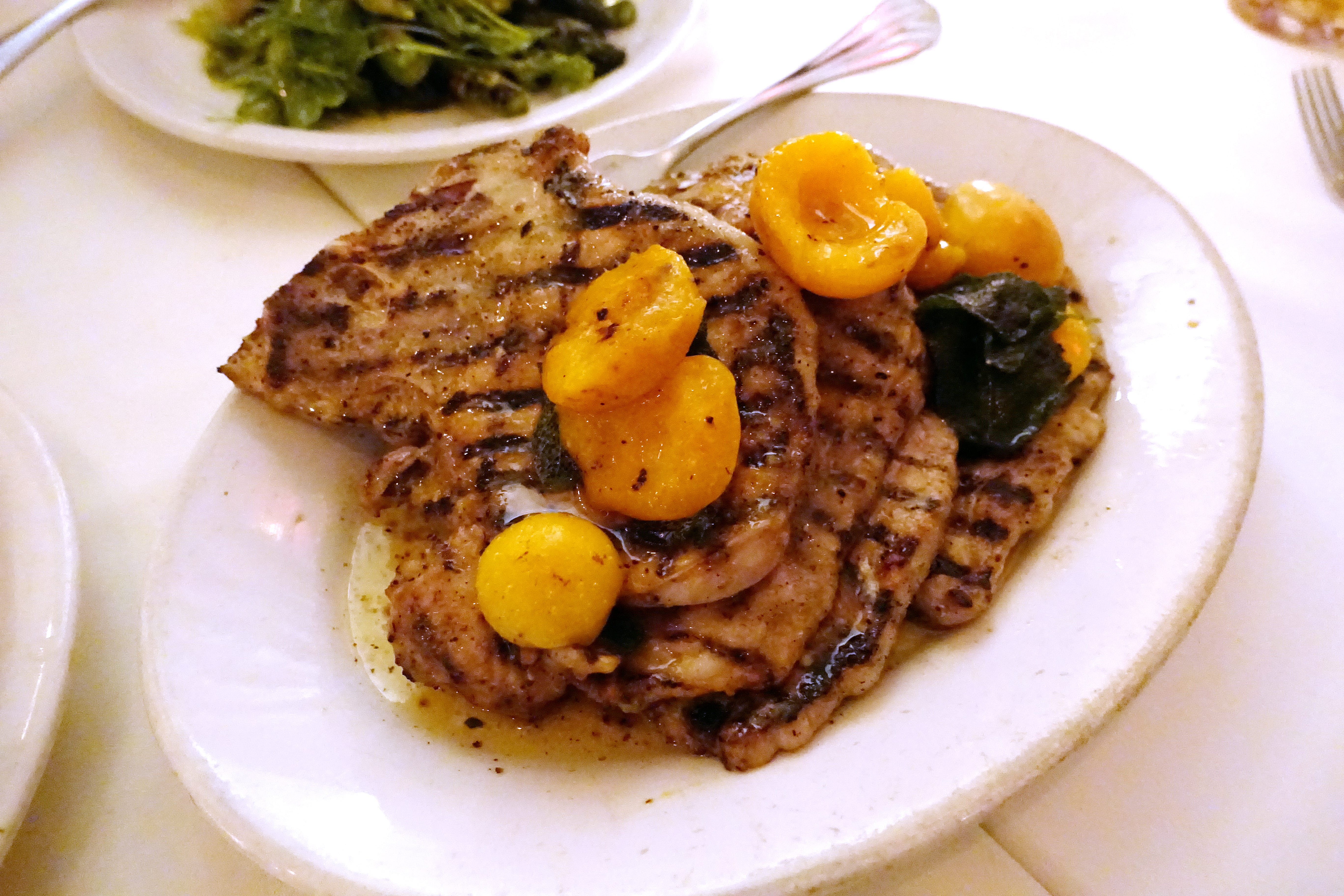 Thin cut pork chops with apricot, Kelton Lane mustard, brown butter and sage at Tratto in Phoenix.
