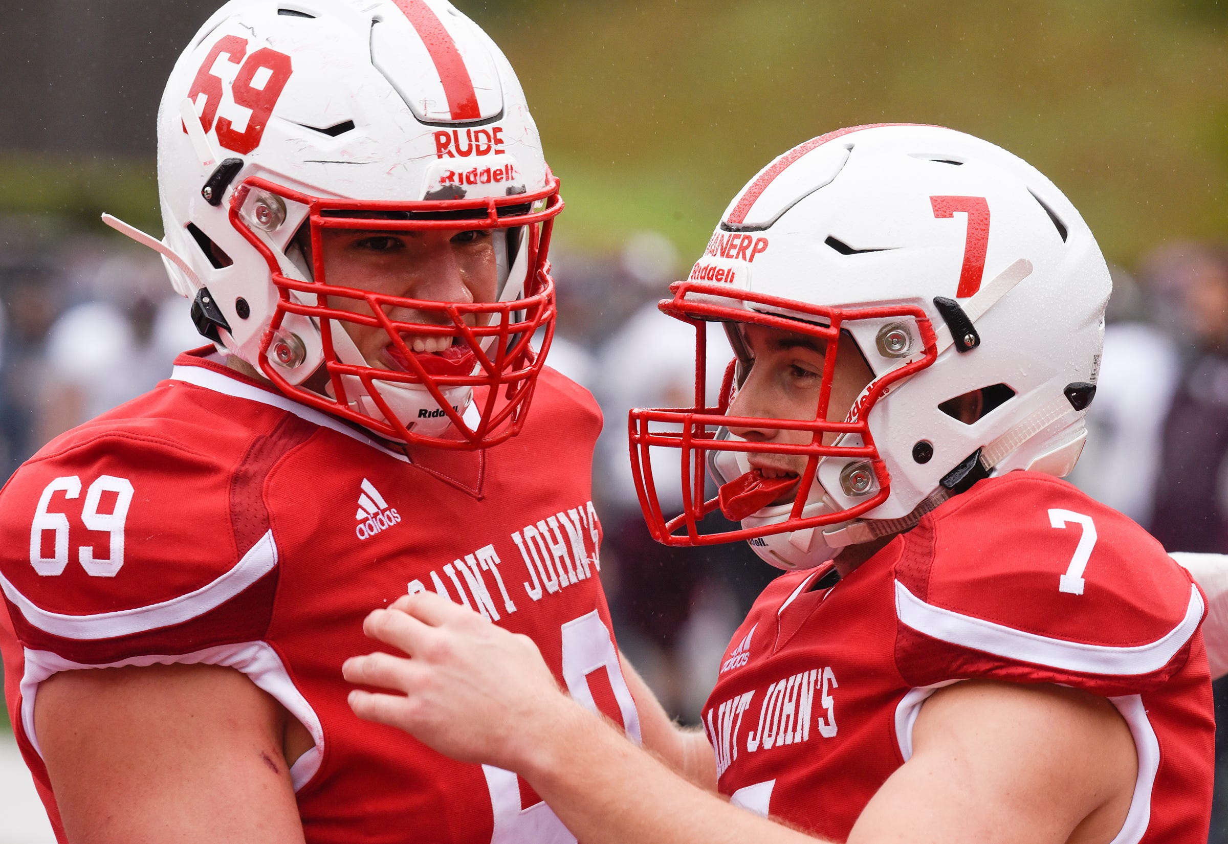 St. John's University football Johnnies celebrate with win