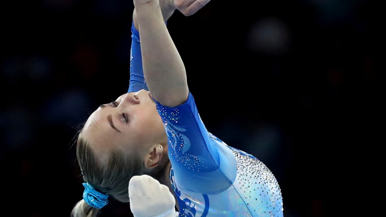 Gymnast Angelina Melnikova Stays Calm After Hair Issue During Routine