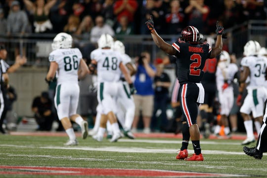 Ohio State running back J.K. Dobbins, right, celebrates an Ohio State touchdown against Michigan State during the first half of an NCAA college football game Saturday, Oct. 5, 2019, in Columbus, Ohio. (AP Photo/Jay LaPrete)