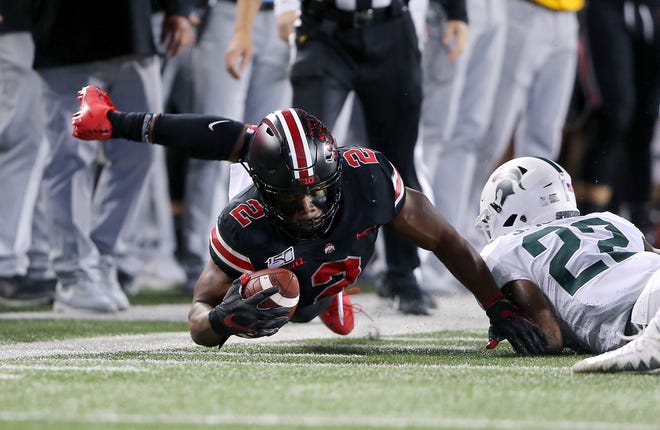 Ohio State tailback J.K. Dobbins had another huge game, rushing for 172 yards and a 67-yard touchdown in the Buckeyes' 34-10 win over Michigan State.