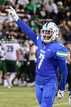 UWF defensive back D'Anthony Bell (7) signals for a UWF first down after the Argos stopped Delta State on a fourth down play on Saturday, October 5, 2019, during the homecoming game at Blue Wahoos Stadium.