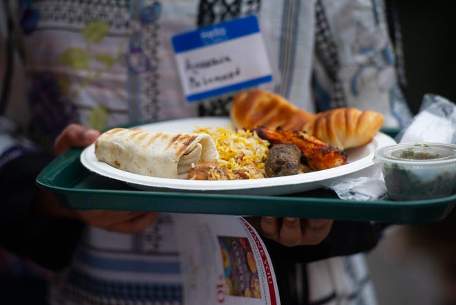 Proceeds from every delicious plate at the Islamic Society of Evansville's International Food Festival benefit the Tri-State Food Bank, Newburgh, Sunday afternoon, Oct. 6, 2019.
