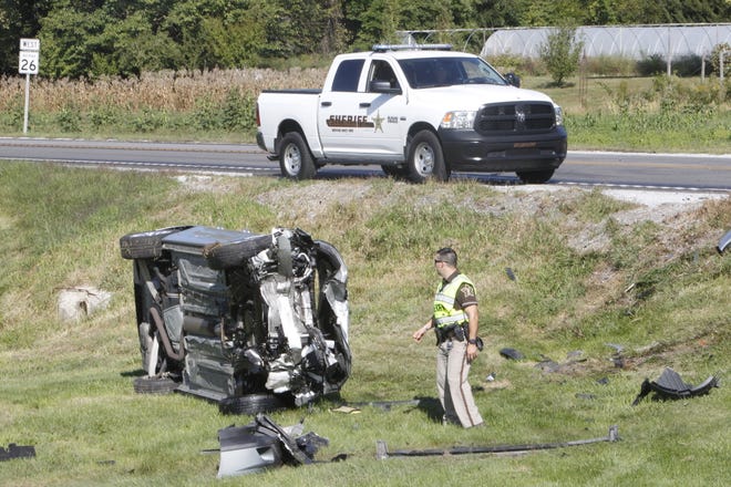 This silver Chevy Impala rolled off the southwest corner of Indiana 26 and Tippecanoe County Road 900 East after it collided with a westbound Buick Rendezvous.