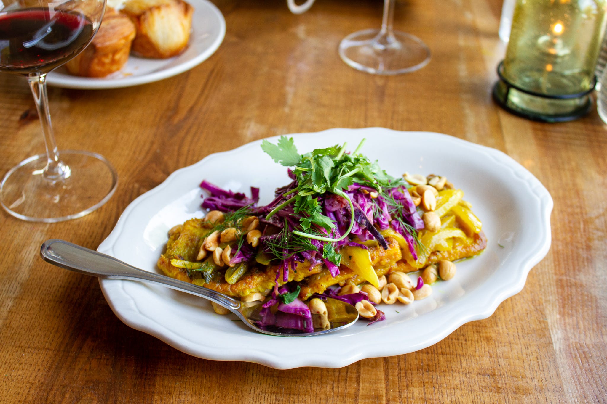 Midwest ingredients meet immigrants' influences on the changing menu at Story Hill BKC, 5100 W. Blue Mound Road. Here, dill and turmeric season whitefish.