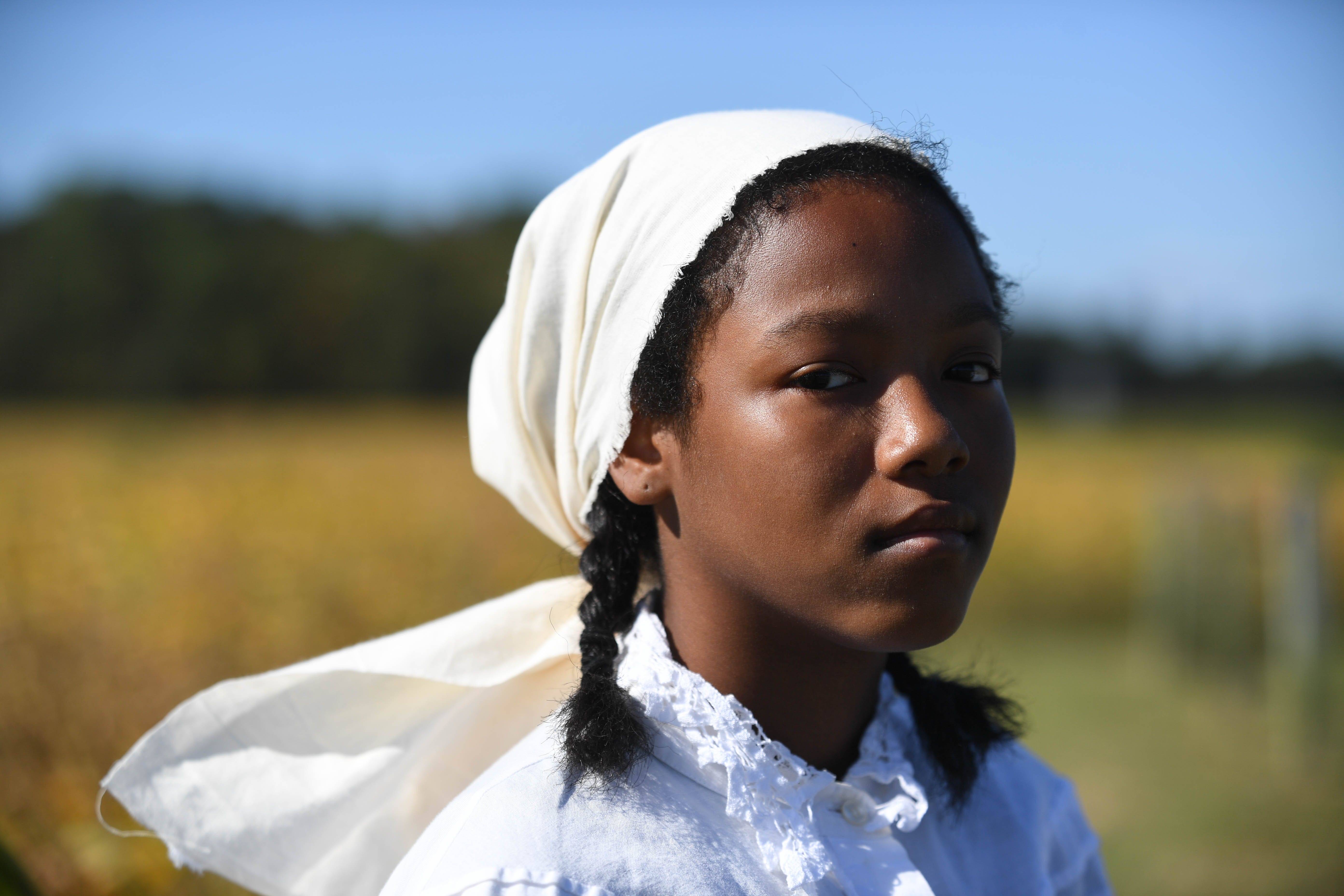 Harriet Tubman, according to Clara Smalls, an emeritus history professor at Salisbury University, didn't know how to clean properly, got sick while working and fell asleep at random times. Her overseers beat her so violently, she had scars. Reenactor Sydney Rushing portrays Tubman.