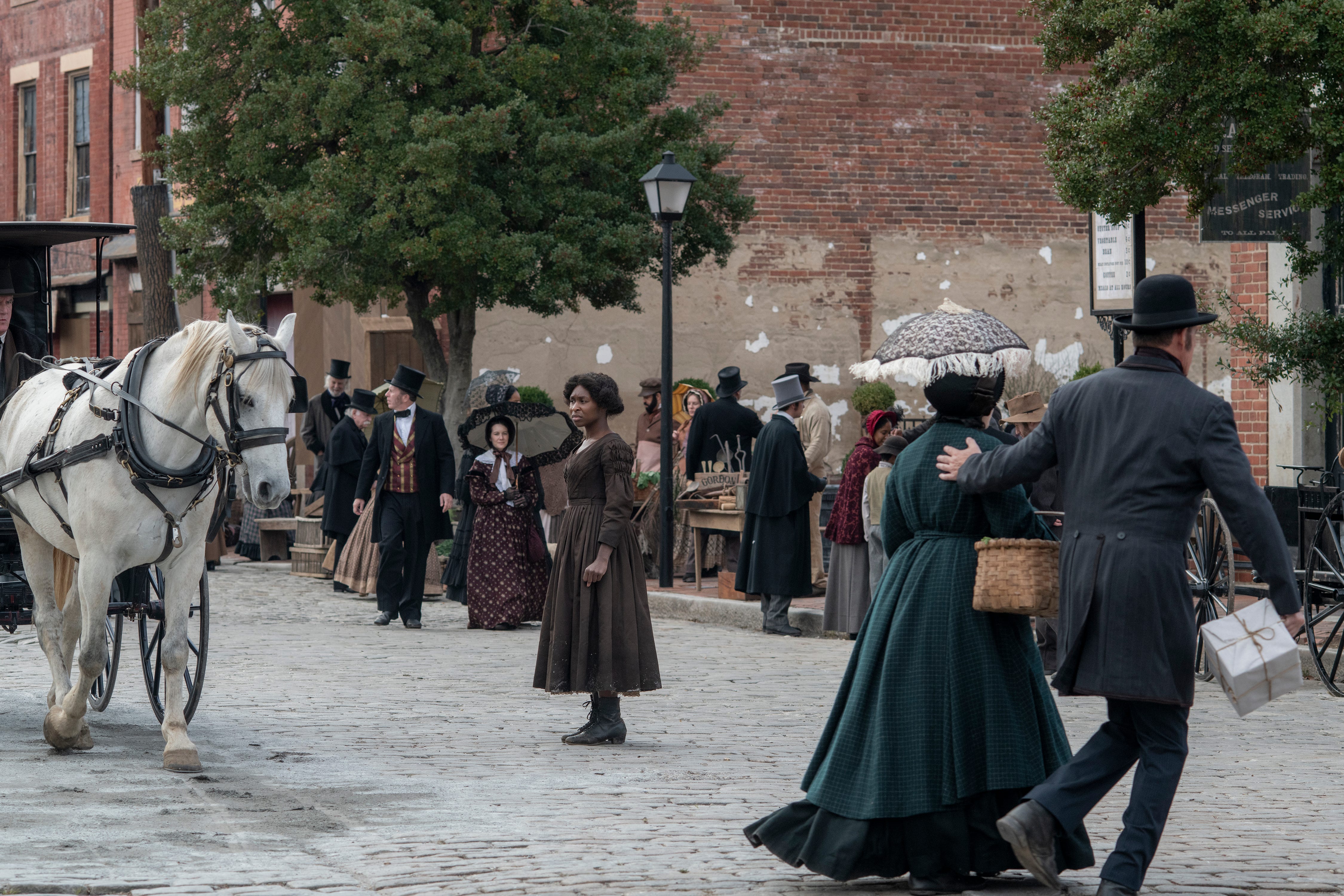 Cynthia Erivo (center) stars as Harriet Tubman in "Harriet," a Focus Features release.