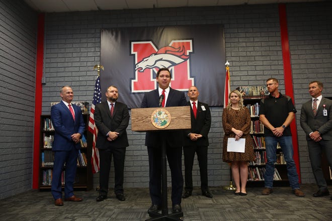 Gov. Ron DeSantis announces proposal to increase minimum salary for Florida teachers while at Middleburg High School in Clay County Oct. 7, 2019.