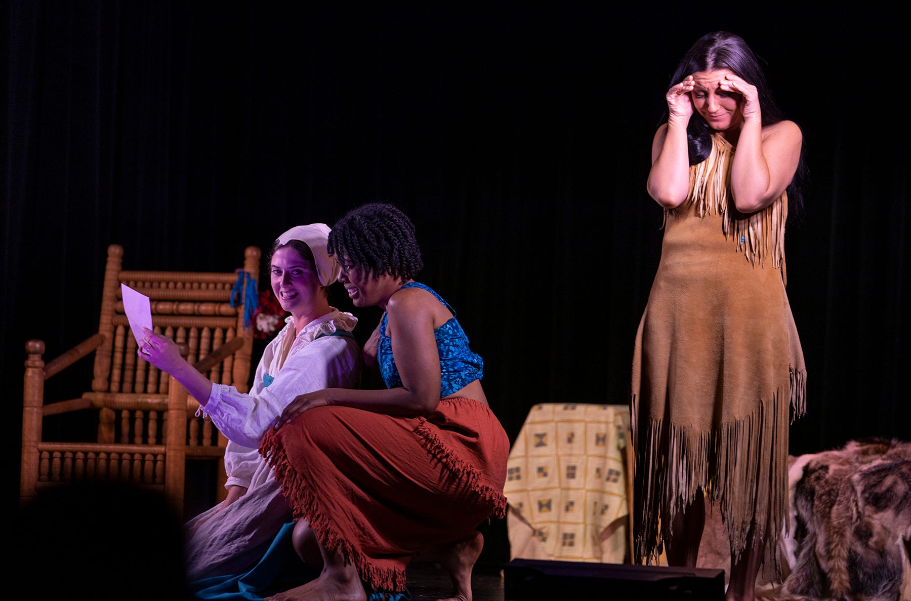 Shalandis Wheeler Smith, center, portrays the enslaved African woman Angela in “Mother Tongue,” an original play written by Abigail Schumann for the Jamestown Settlement museum. With Michelle Smith, left, as English colonist Anne Burras Laydon and Heather Doré Johnson, right, as the indigenous woman Matoaka (Pocahontas), the play imagines the women meeting and comparing their shared histories and very different experiences.