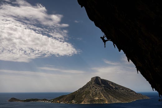 A climber participates in the 2019 annual Climbing Festival in the Greek island of Kalymnos on Oct. 4, 2019. The geography, breathtaking views and great weather conditions have made Kalymnos a top destination for international rock climbers of all levels with more than 2500 climbing routes.