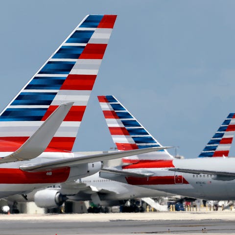 American Airlines jets taxi at Miami International