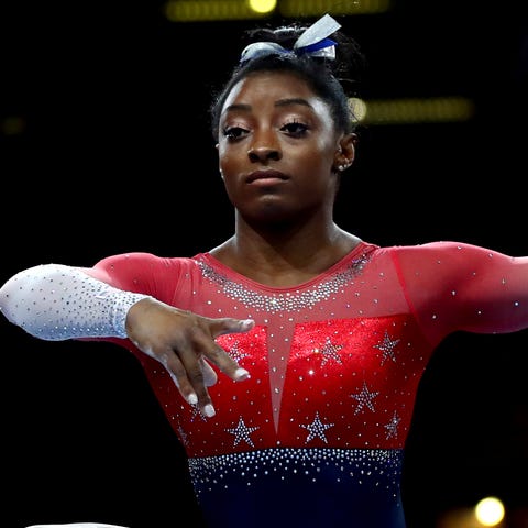 Simone Biles of the U.S. performs on the balance b