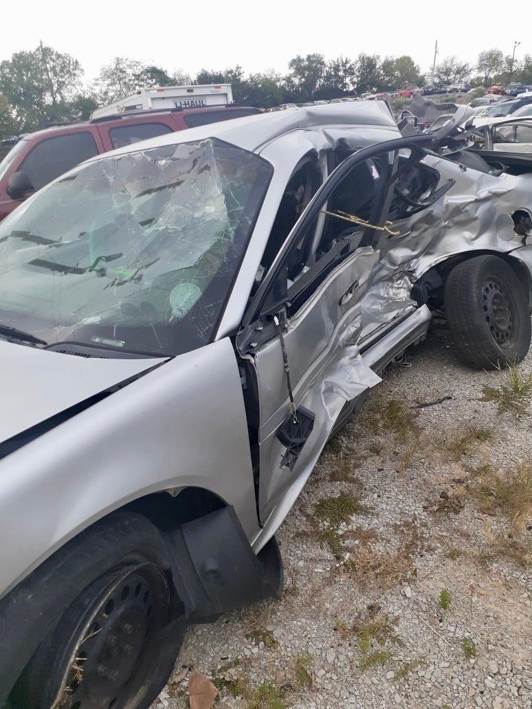 Ryan Sellers'  Pontiac Grand Prix was totaled after a man fleeing police in a stolen car crashed into her at Garland Avenue and Louis Coleman Jr. Drive.