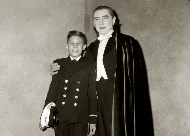Bela Lugois Jr., wearing school uniform from Elsinore Naval and Military School in California, visits his father on the set of "Abbott and Costello Meet Frankenstein."