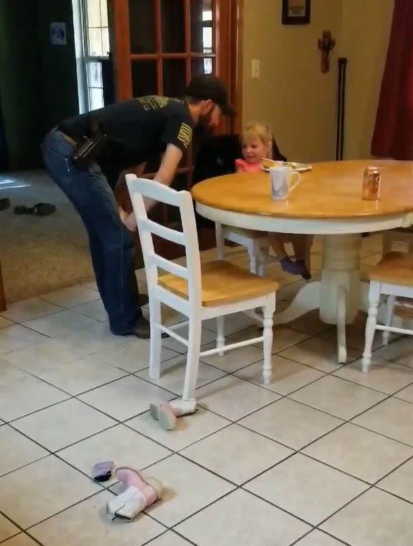 This still is from a video shared privately on Facebook in May 2018. In the video, former police chief and convicted killer Tim Dean slaps his then 3-year-old daughter for not eating her breakfast. Dean's wife, Charlene Childers, recorded the video, which lasts 35 seconds.