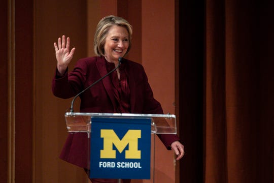Former Secretary of State Hillary Clinton waves at the crowd as she walk onto stage during the Weiser Diplomacy Center Inaugural Lecture at the U-M's Rackham, Auditorium in Ann Arbor, Thursday, Oct. 10, 2019. 

