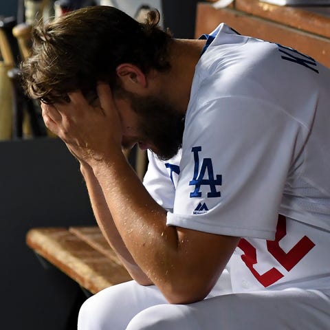 Kershaw in the dugout after being removed in the e