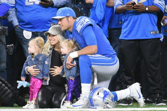 Detroit Lions quarterback Matthew Stafford (9) with his wife Kelly Stafford and daughters before the game against the Seattle Seahawks at Ford Field in Detroit on Oct. 28, 2018.