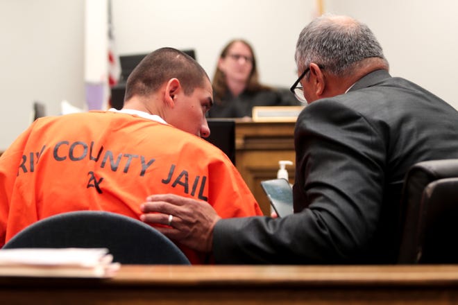 Anthony Torres speaks with his attorney on Wednesday, October 9, 2019 at Indio Juvenile Courthouse in Indio, Calif.