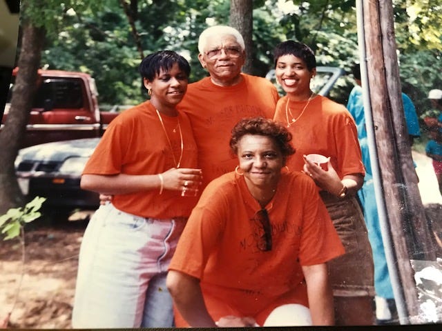 Deborah Barfield Berry, (left), with her late grandfather, William "Herbert" Montgomery, mother, Carrie Barfield, (center), and sister, Selina Barfield Brodie, (right). They regularly attended summer family reunions in Sumter, South Carolina.  The Montgomery and Budden families continue to host family gatherings. Berry knew much more about her family history on her mother's side than her father's.