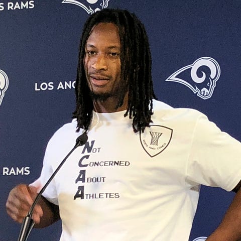 Todd Gurley wears a t-shirt reading "Not Concerned