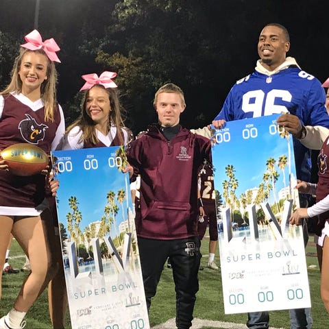 Park Ridge volunteer coach Matt Gray surprised wit