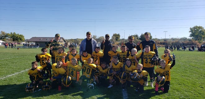 The Farmington Storm second grade football team finished the 2019 Young America Football League season undefeated at 7-0 after holding off Aztec for an 8-0 victory Oct. 12 at Aztec YAFL Field.