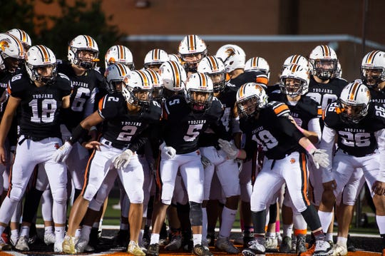 The York Suburban Trojans get pumped up before a YAIAA Division II football game against Gettysburg in Spring Garden Township on Friday, October 11, 2019.