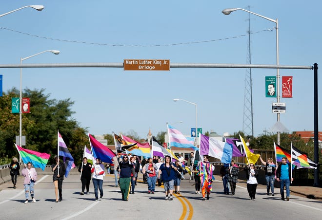 In this 2019 file photo, people march in the Ozarks Pridefest parade. Ozarks Pridefest 2021 was canceled again this year due to the pandemic.
