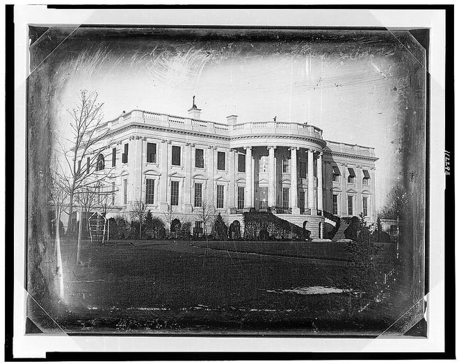 President's house (i.e., White House), Washington, D.C., showing south side, probably taken in winter.