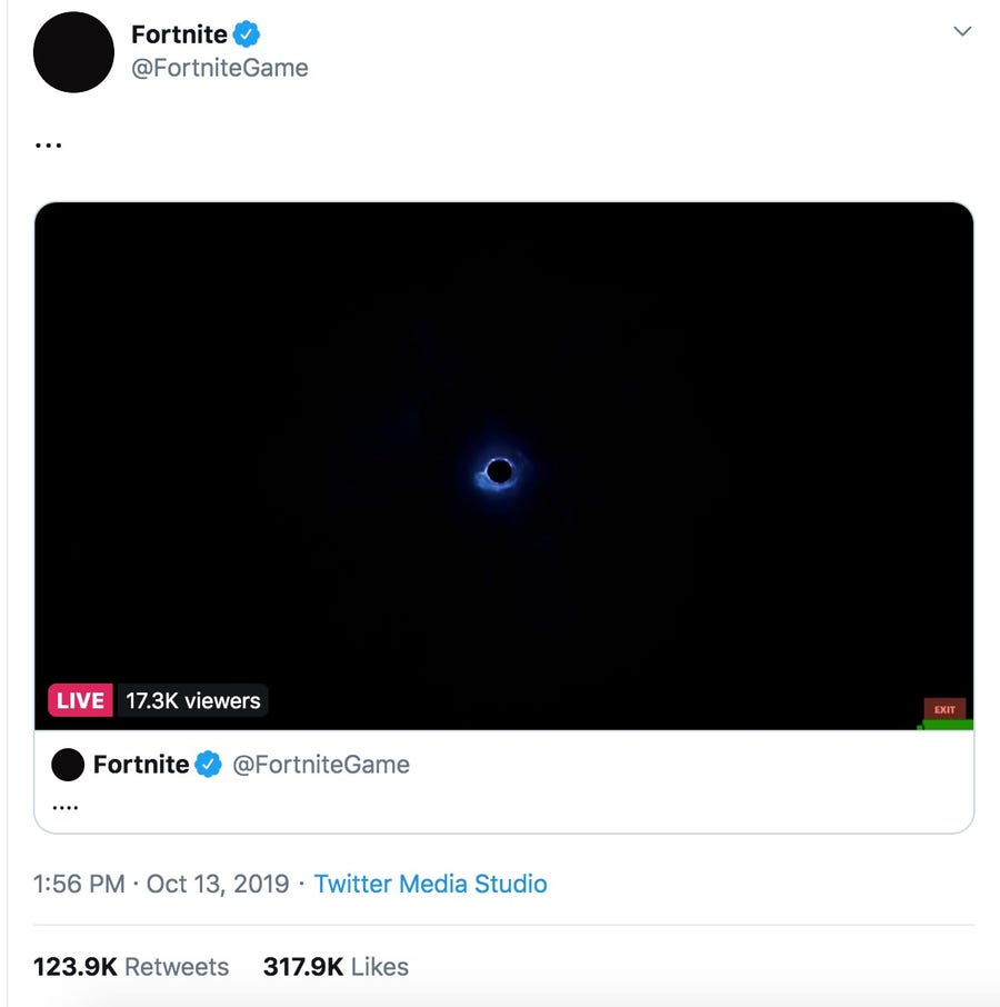 A screenshot of a live video feed from the Fortnite Twitter account showing the black hole consuming the game and leaving it unplayable.