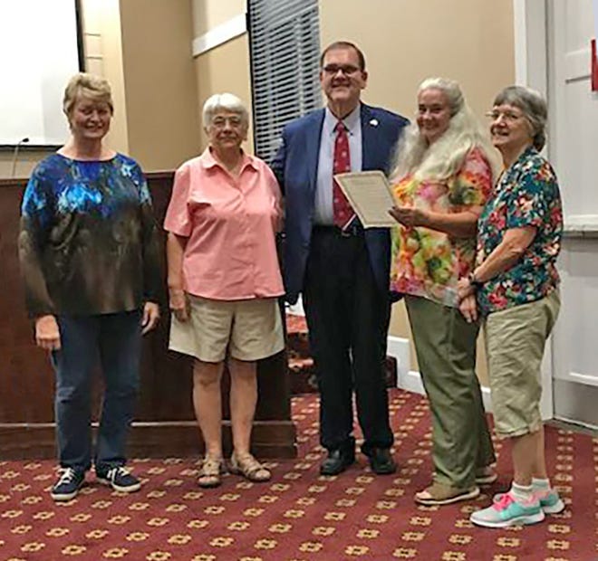 FCE Week Proclamation at City Commissioner meeting. Left to right: Carol McClure, leader of Fairview FCE night group; Kathy Tarolli, FCE member; John Blade, mayor of Fairview; Sarah Lauricella, Co-President Fairview day group; Mae Alt, secretary Fairview FCE day group.