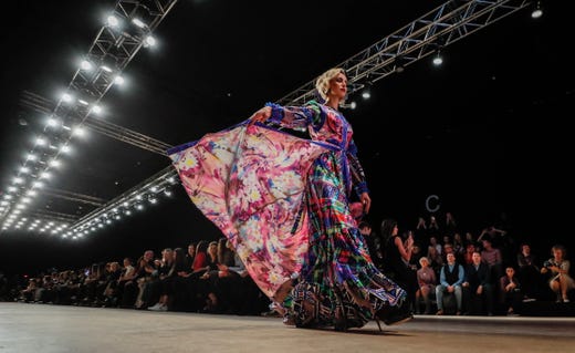 A model presents a creation of Russian fashion designer Slava Zaitsev during special show ÔMoscow and MuscovitesÕ at the Mercedes-Benz Fashion Week Russia in Moscow, Russia on October 15, 2019. 