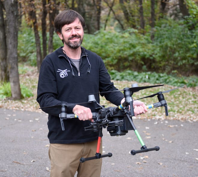 Steve Fines shows his drone that helped find missing 6-year-old Ethan Haus Wednesday, Oct. 16, 2019. 