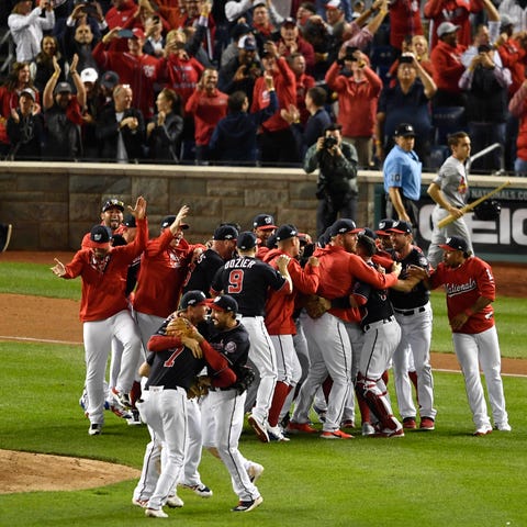 The Washington Nationals celebrate after clinching