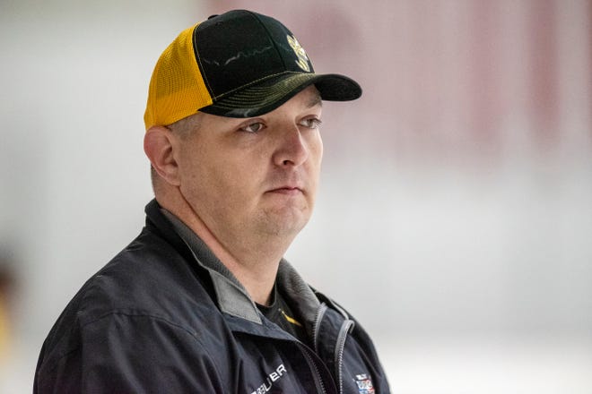 Coach Clint Hagmaier observes players during the Battle Creek Rumble Bees preseason training camp on Thursday, Oct. 17, 2019 at The Rink in Battle Creek, Mich.