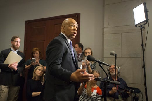  Elijah Cummings delivers remarks to members of the news media after attending a closed meeting of the House Select Committee on Benghazi, on Capitol Hill in Washington, DC on October 6, 2015. 