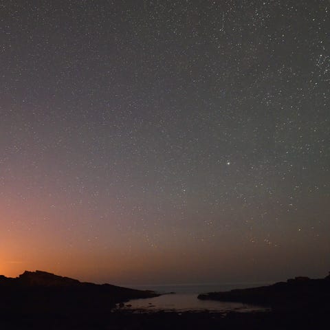 An Orionid meteor shoots across the sky on Thursda