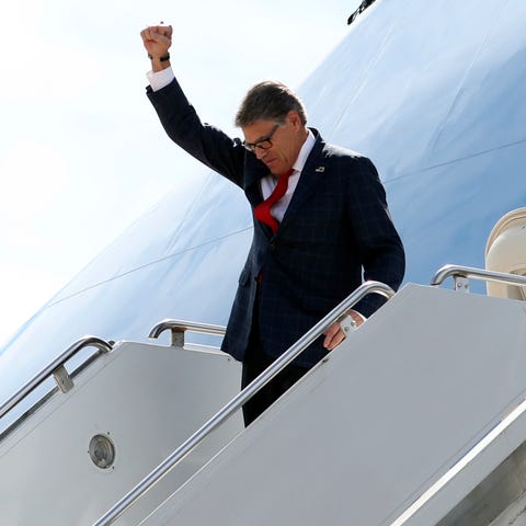Energy Secretary Rick Perry gestures as he arrives