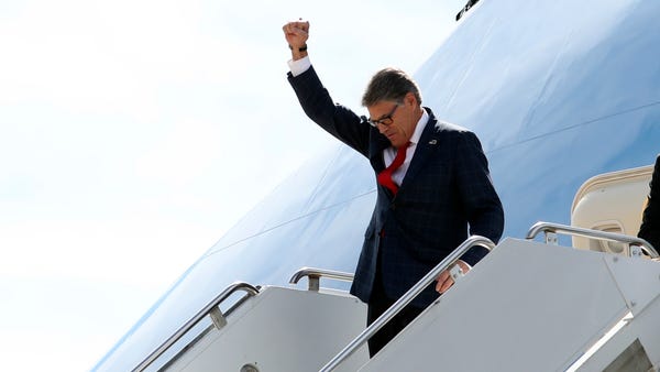 Energy Secretary Rick Perry gestures as he arrives