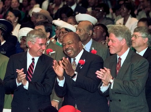Former President Bill Clinton, Rep. Elijah Cummings, D-Md. and Former Maryland Gov. Parris Glendening participate in church services at New Psalmist Baptist Church in Baltimore on Nov. 1, 1998.