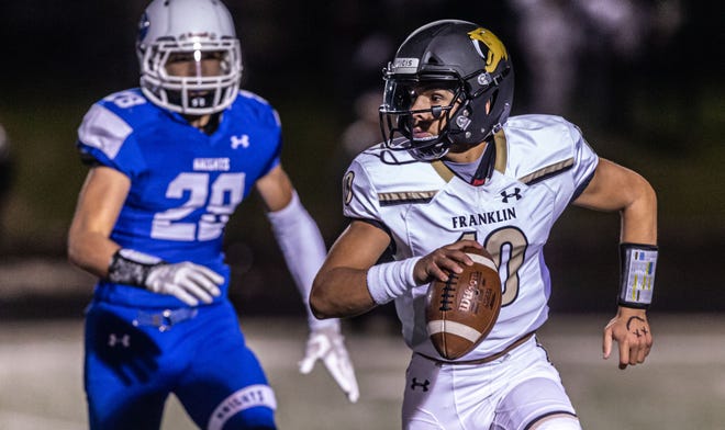 Franklin quarterback Myles Burkett passed for 11 touchdowns and ran for one as a junior in the abbreviated 2020 season.