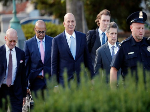 US Ambassador to the European Union Gordon Sondland, center, arrives for a joint interview with the House Committee on Foreign Affairs, House Permanent Select Committee on Intelligence, and House Committee on Oversight and Reform on Capitol Hill in Washington, Oct. 17, 2019. Sondalnd told the House impeachment panel investigating President Donald Trump that he was disappointed that he had to consult with the president's personal lawyer Rudy Giuliani on Ukraine policy.