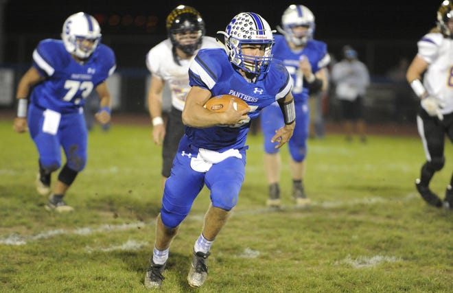Southeastern quarterback Lane Ruby runs the ball during a 28-21 win over Unioto High School at Southeastern High School on Friday, Oct. 18, 2019 in Chillicothe, Ohio.