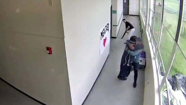 High school coach disarms and hugs shotgun-carryin