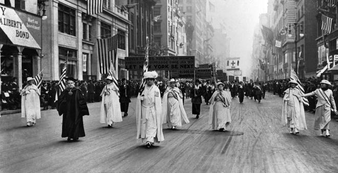 Dr. Anna Shaw and Carrie Chapman Catt, founder of the League of Women Voters, lead an estimated 20,000 supporters in a women's suffrage march on New York's Fifth Ave. in 1915.