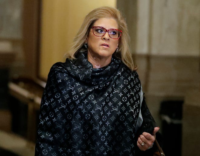 State Rep. Mara Candelaria Reardon arrives for a hearing at the state Supreme Court in the Statehouse, Monday, Oct. 21, 2019, in Indianapolis.