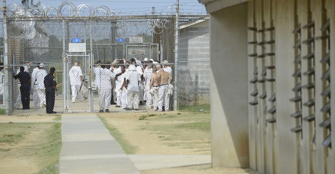 Inmates arrive back at Staton Correctional Facility after participating in educational programs in 2013