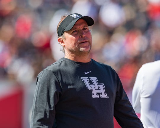Coach Dana Holgorsen had a 61-41 record in eight seasons at West Virginian before moving to Houston this season.