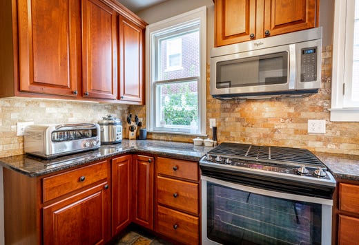 The three-story house with five bedrooms, four baths and over 4,300 square feet of living space, was built in 1920, and is being offered for sale at just under half a million dollars.